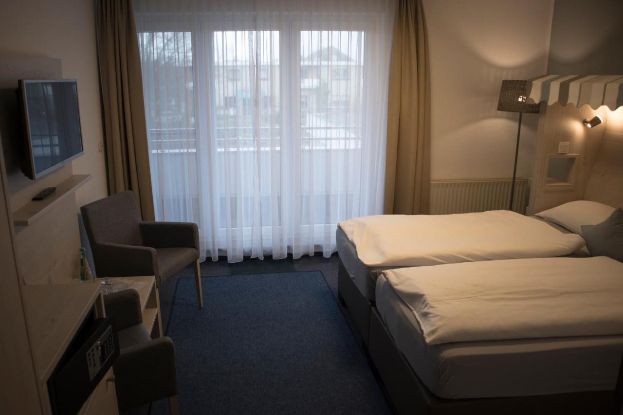 Hotel Am Friesenstrand Tossens Exterior photo
