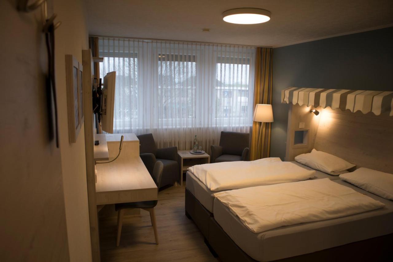 Hotel Am Friesenstrand Tossens Exterior photo