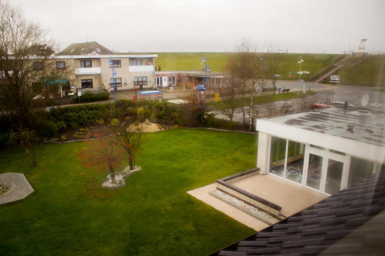 Hotel Am Friesenstrand Tossens Exterior photo